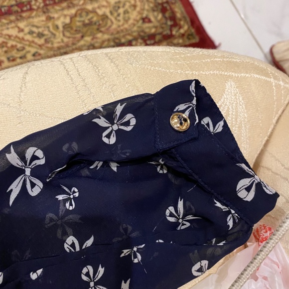 Navy and with white bows printed on shear fabric. Size M juniors - Picture 9 of 11